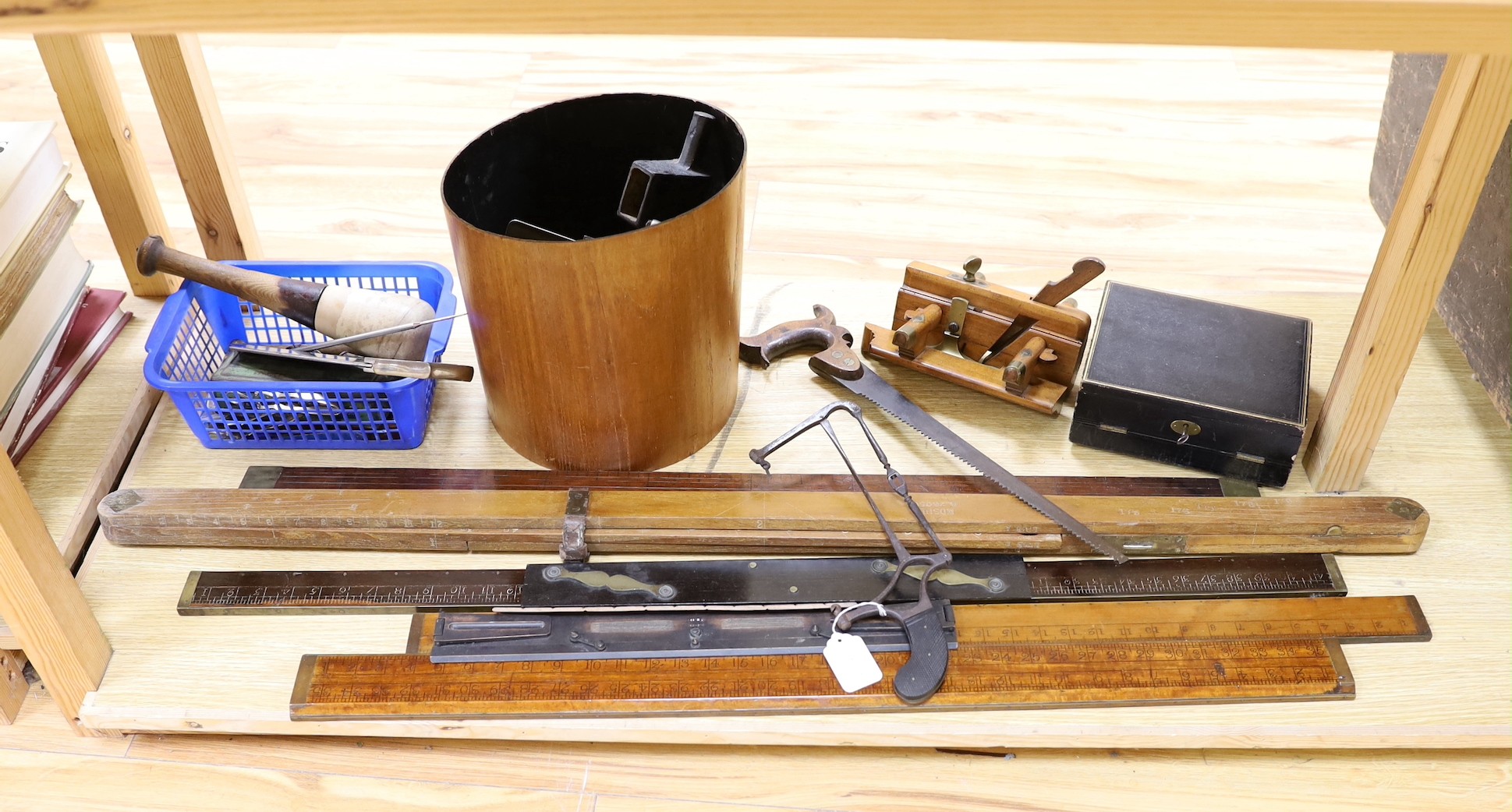 A leather writing box, a collection of wooden rulers, a small collection of wood working and surgeon’s tools etc